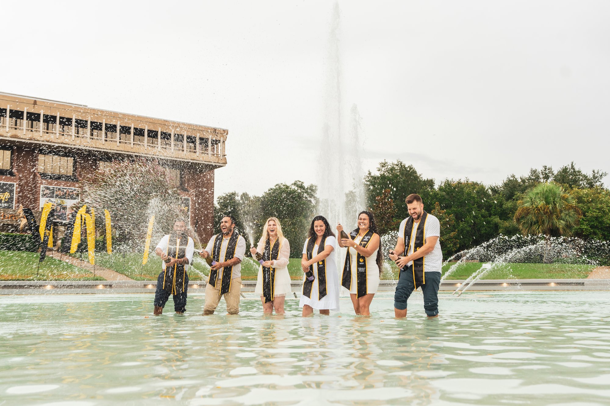 UCF graduation photos Orlando — Reflecting Pond celebration